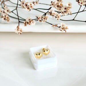 Aros abridores de acero dorado a rosca. Corazón.