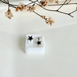 Aros abridores de acero, estrella esmaltada negra.