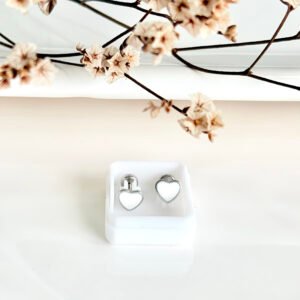 Aros abridores de acero, corazón blanco esmaltado.