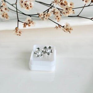 Aros abridores de acero, flor con perla.