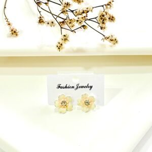 Aros con pasantes. acero blanco, forma de flor con piedra.