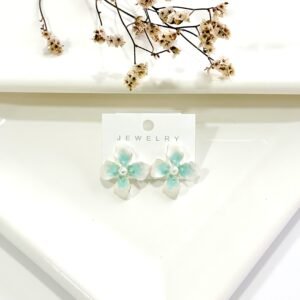 Aros con pasantes. acero blanco, forma de flor con perla.