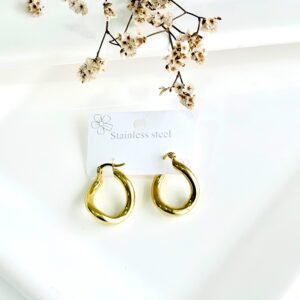 Aros de acero dorado. 2.5 cm.
