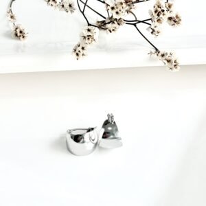 Aros de acero estilo argollas bombé. 1.5 cm de diámetro.