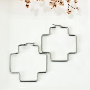 Aros de acero, forma de cruz. 5.5 cm.