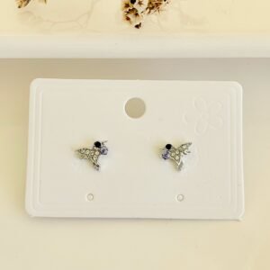 Aros pasantes, colibrí con strass y piedra lila.