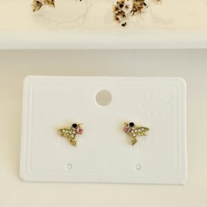 Aros pasantes, colibrí dorado con strass y piedra rosa.