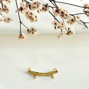 Percha de acero dorado para dos dijes.