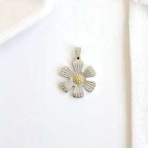 Dije flor combinada.