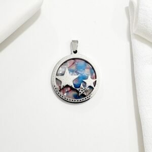 Dije de acero y nacar, centro con estrellas.