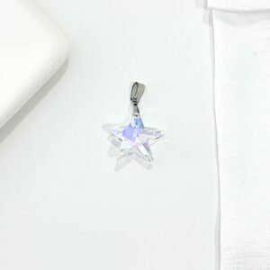 Dije estrella, cristal, tornasol.