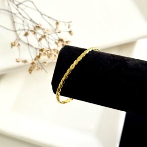 Pulsera acero esclava dorada labrada. 65mm.