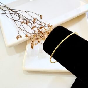 Pulsera acero esclava dorada fina.