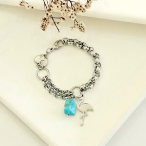 Pulsera acero con dije y piedra.