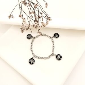 Pulseras acero con dijes árbol de la vida.