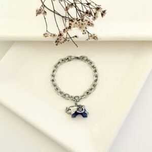 Pulsera acero con dije de elefante.