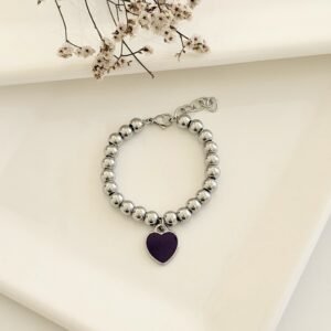 Pulsera acero con dije esmaltado.