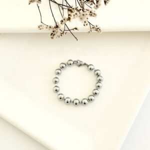 Pulsera acero con pelotitas. x 18cm.