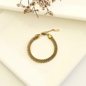 Pulsera acero dorado.