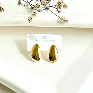 Aros de acero dorado con pasante. 2.5 cm.