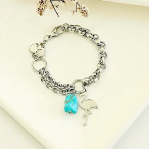 Pulsera acero con dije y piedra.