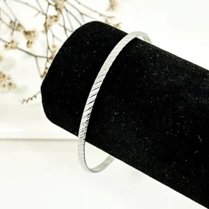 Pulsera esclava labrada de acero. x 65 mm.