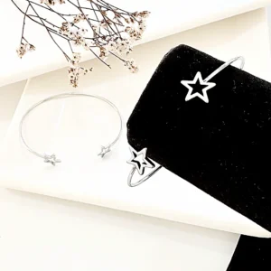 Pulsera esclava de acero, estrellas caladas.