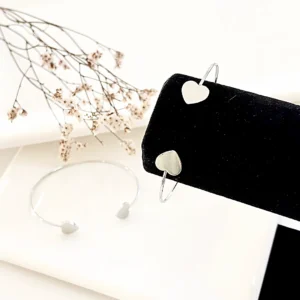 Pulsera esclava de acero, corazones.