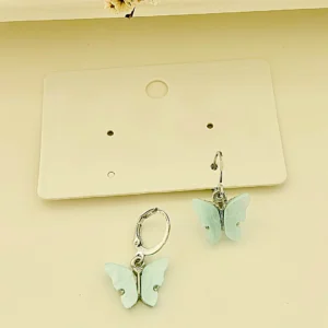 Aros argollas con colgante mariposa celeste.
