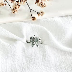 Anillo de acero, mariposa.