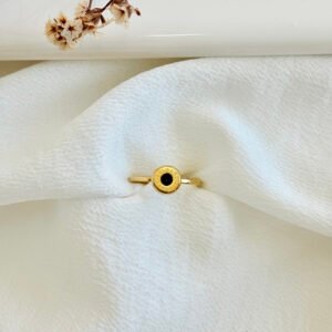 Anillo BVLGARI de acero dorado.