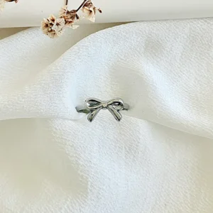Anillo de acero, moño.