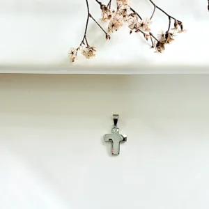 Dije cruz bombé de acero. 1,5 cm. x 1 cm.